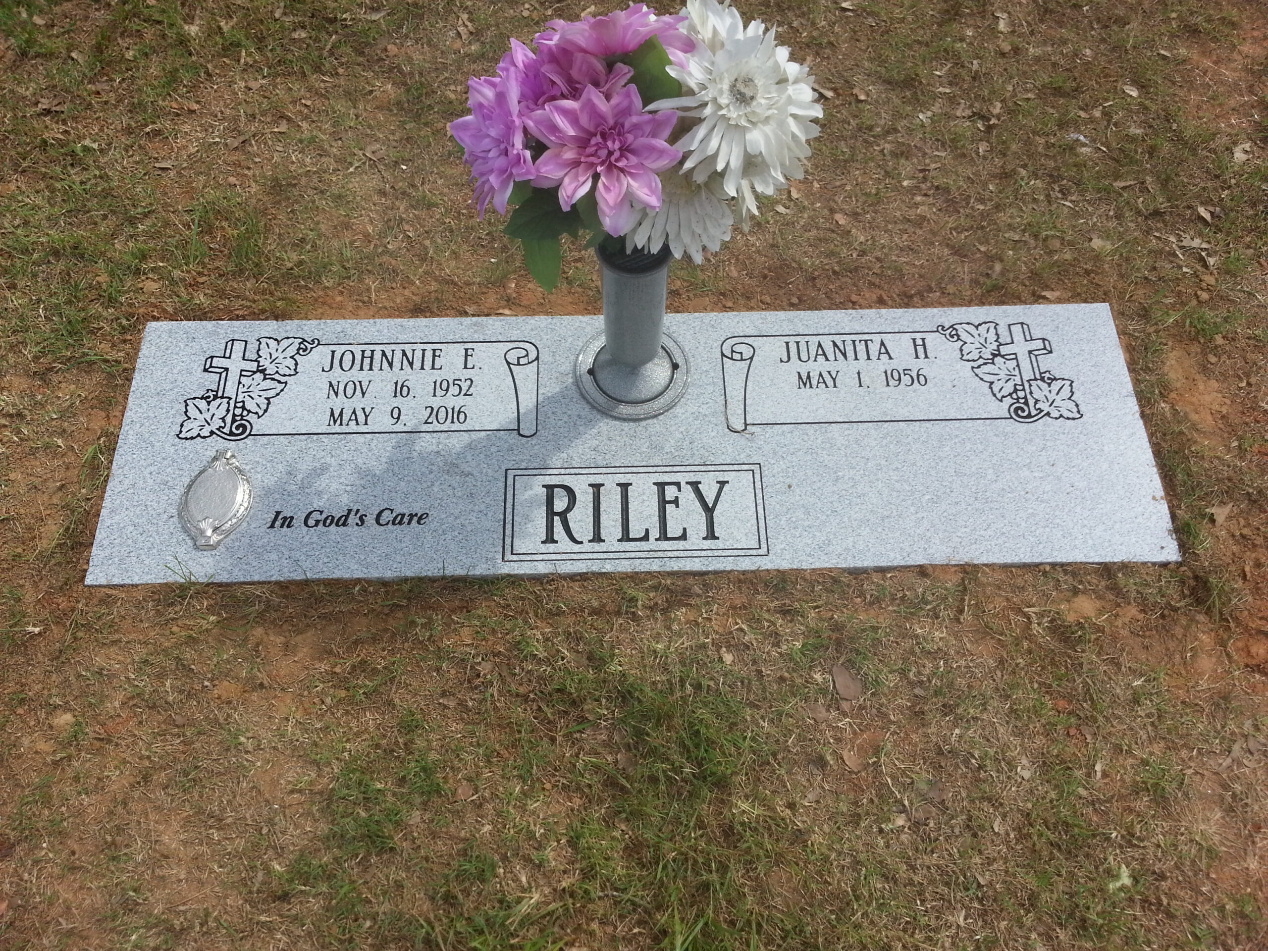 double flat grave marker with vase