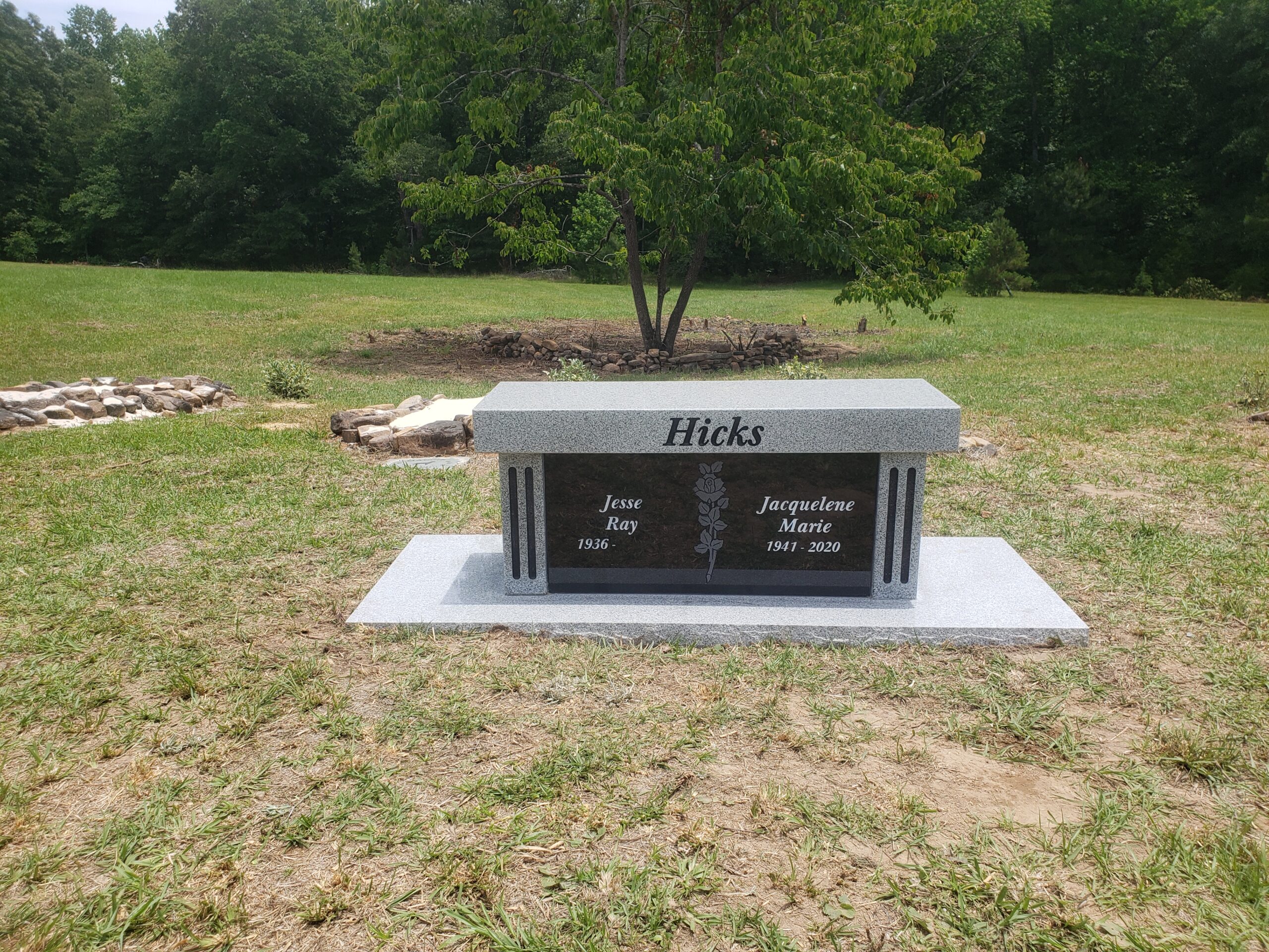 grey and black memorial bench