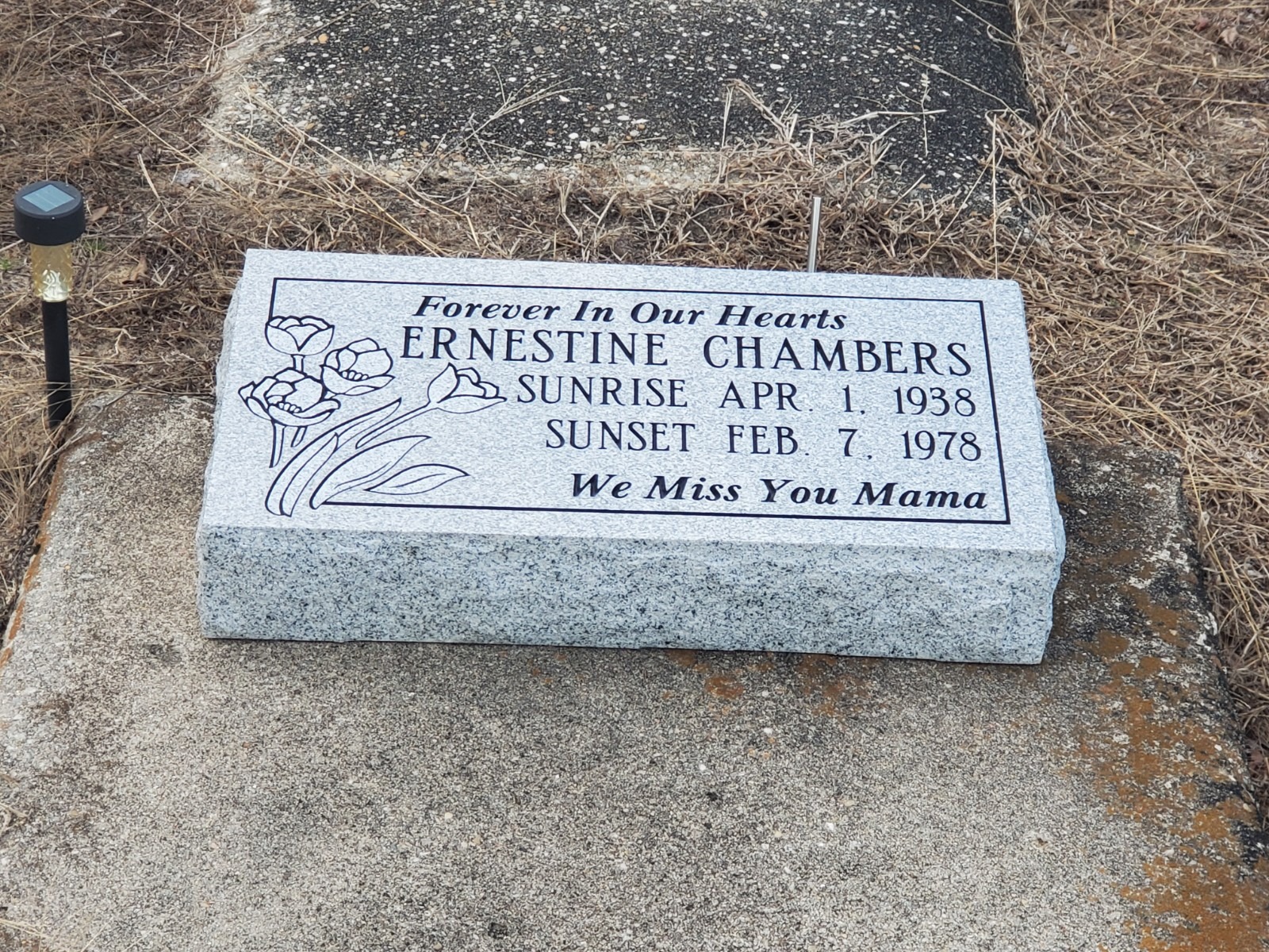 bevel grave marker with floral engraving