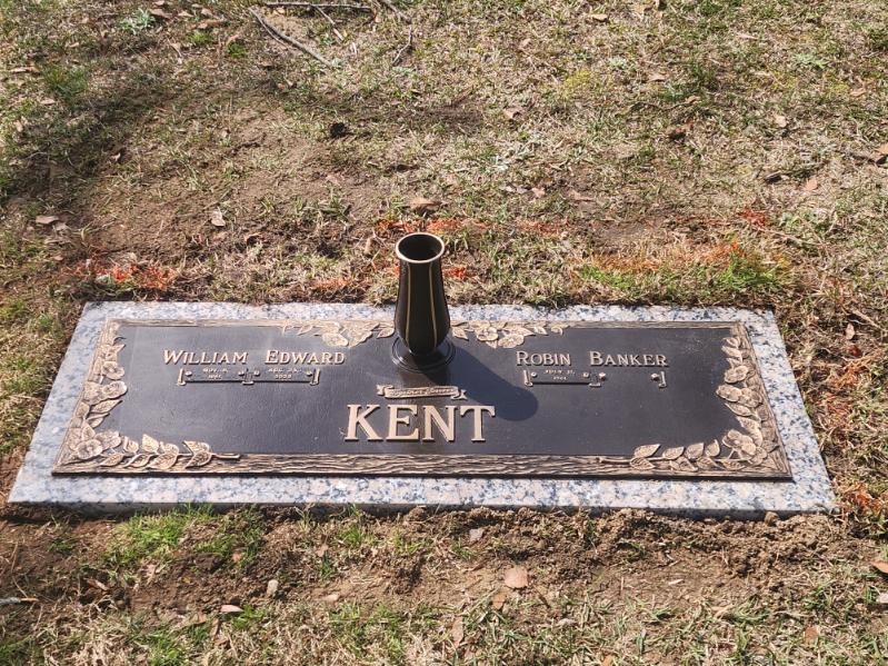 bronze double monument with vase
