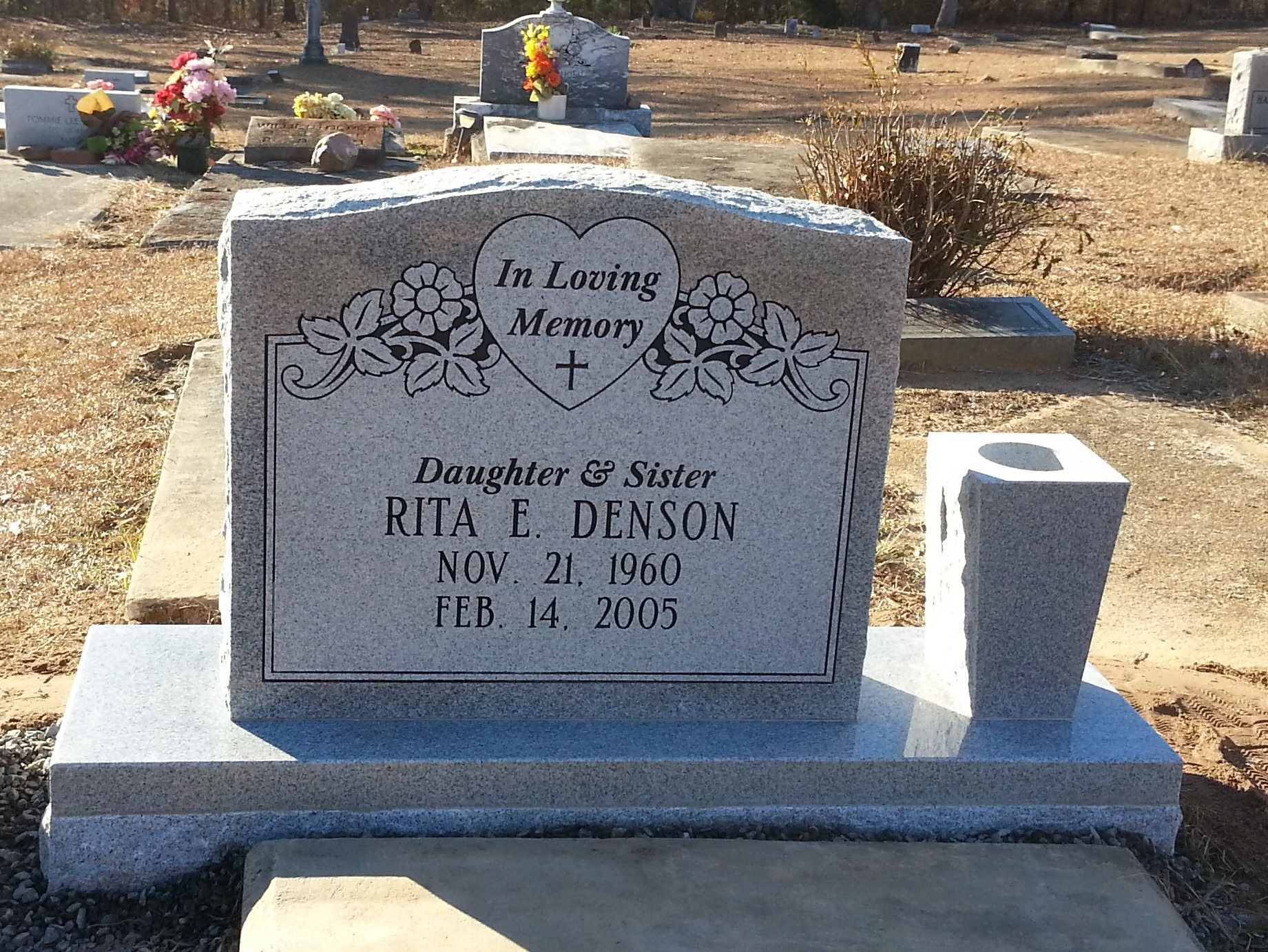 granite headstone with vase